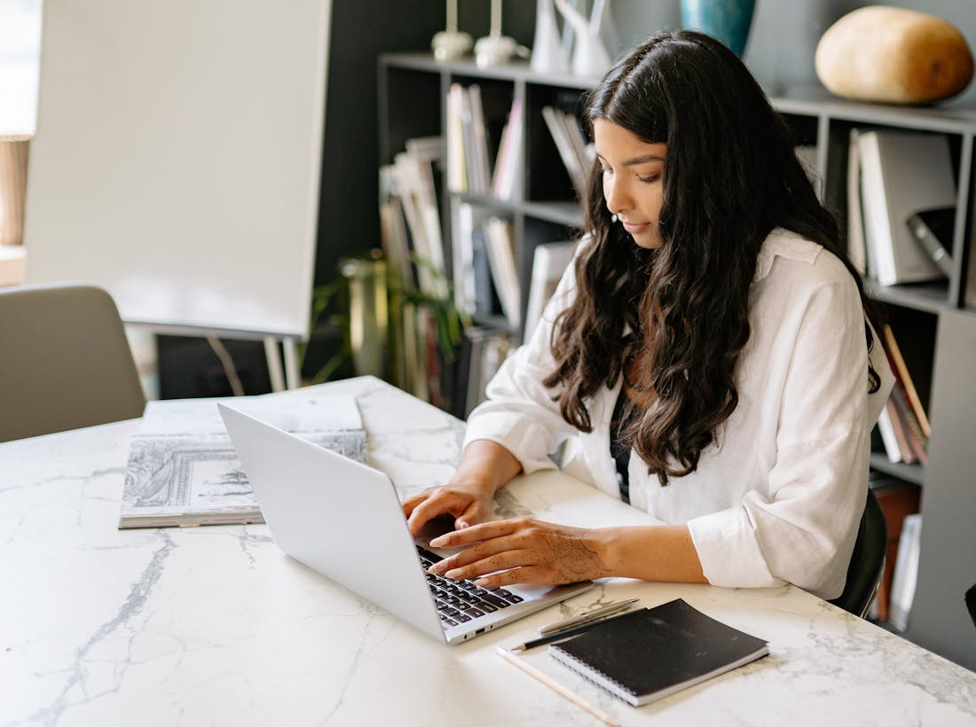 Freelancer managing invoices and payments on a laptop